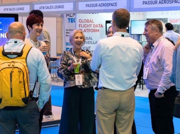World Aviation Festival attendees networking on the expo floor