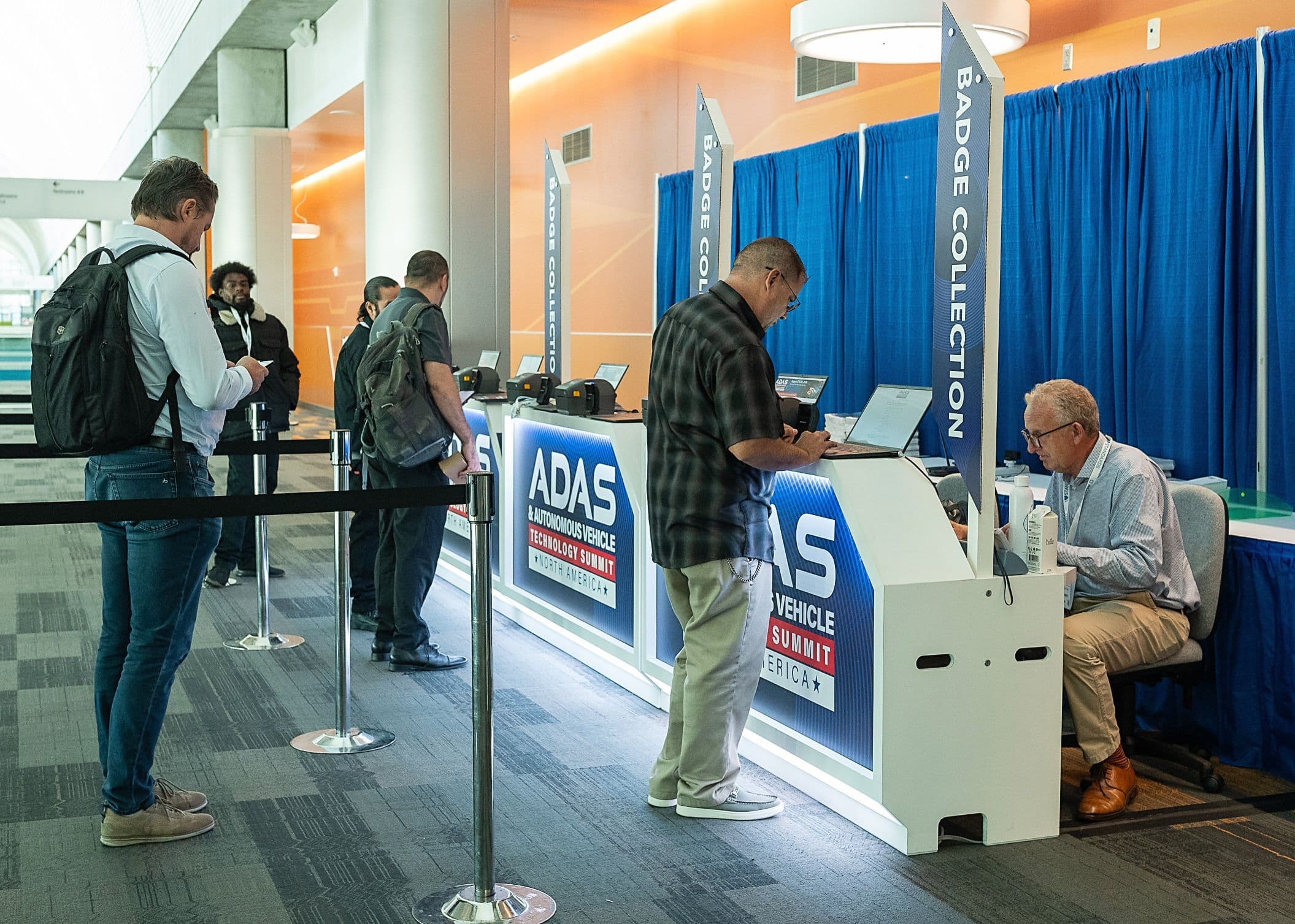 Attendees arrive at registration at the 2025 North America event
