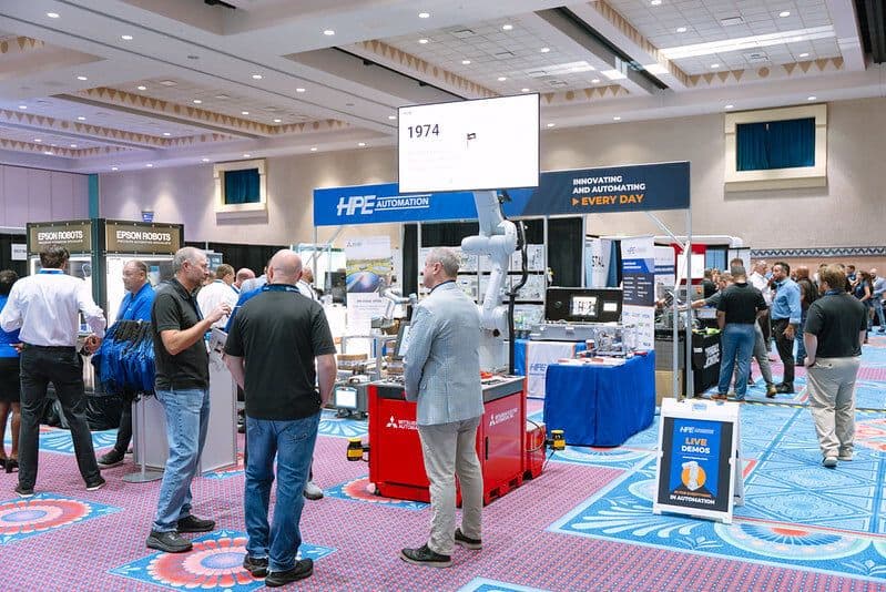 Attendees walking the ISA Automation Summit and Expo floor