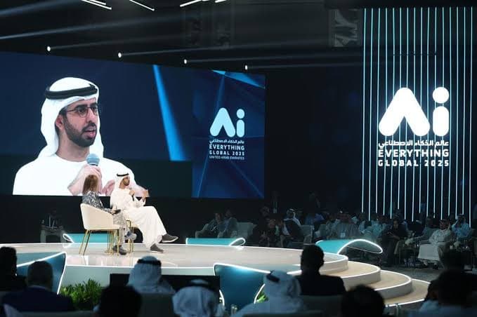 A speaker in traditional Emirati dress in a fireside chat on the Ai Everything Global main stage