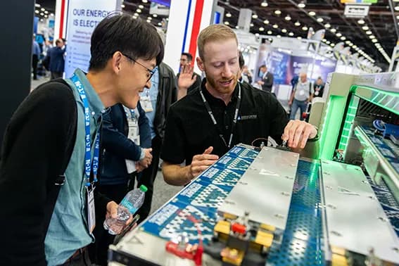 Suppliers and buyers meeting on The Battery Show North America expo floor