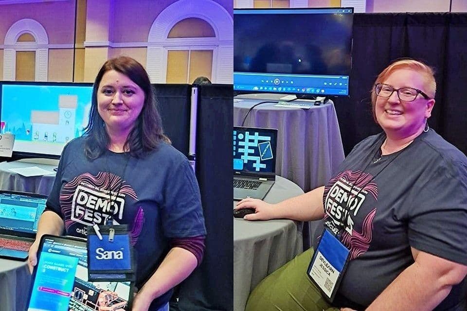 Two students demonstrate learning projects at a prior DevLearn DemoFest