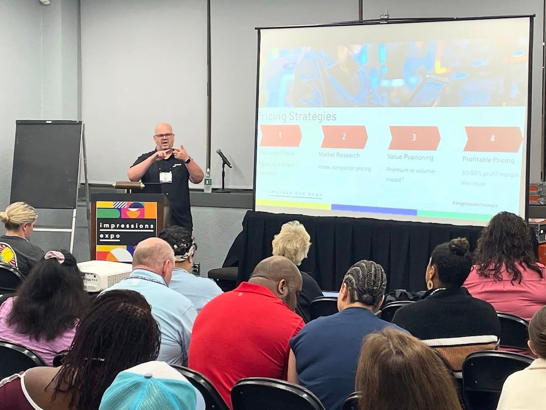 A pricing strategy session at Impressions Expo Dallas