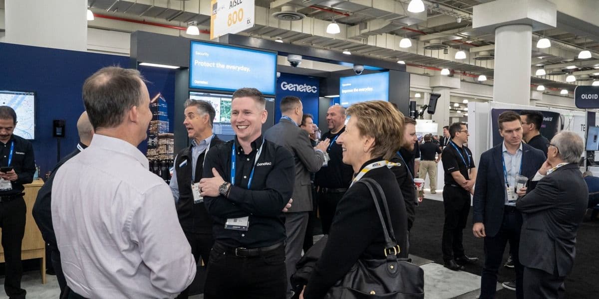 ISC East attendees in conversation on the show floor in 2023