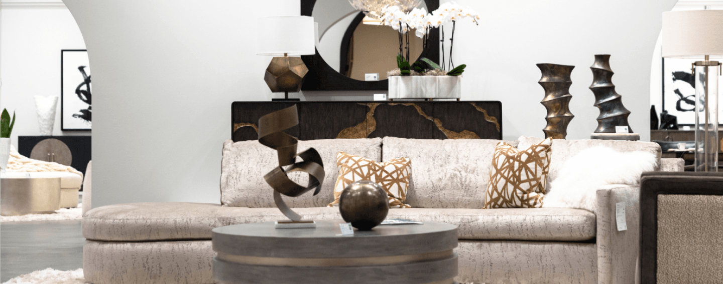 Furniture and decor displayed in an ANDMORE showroom during the Spring 2023 High Point Market.