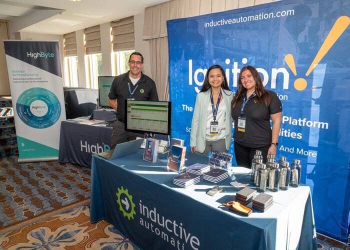 ISA Automation Summit exhibitor speaking with an attendee