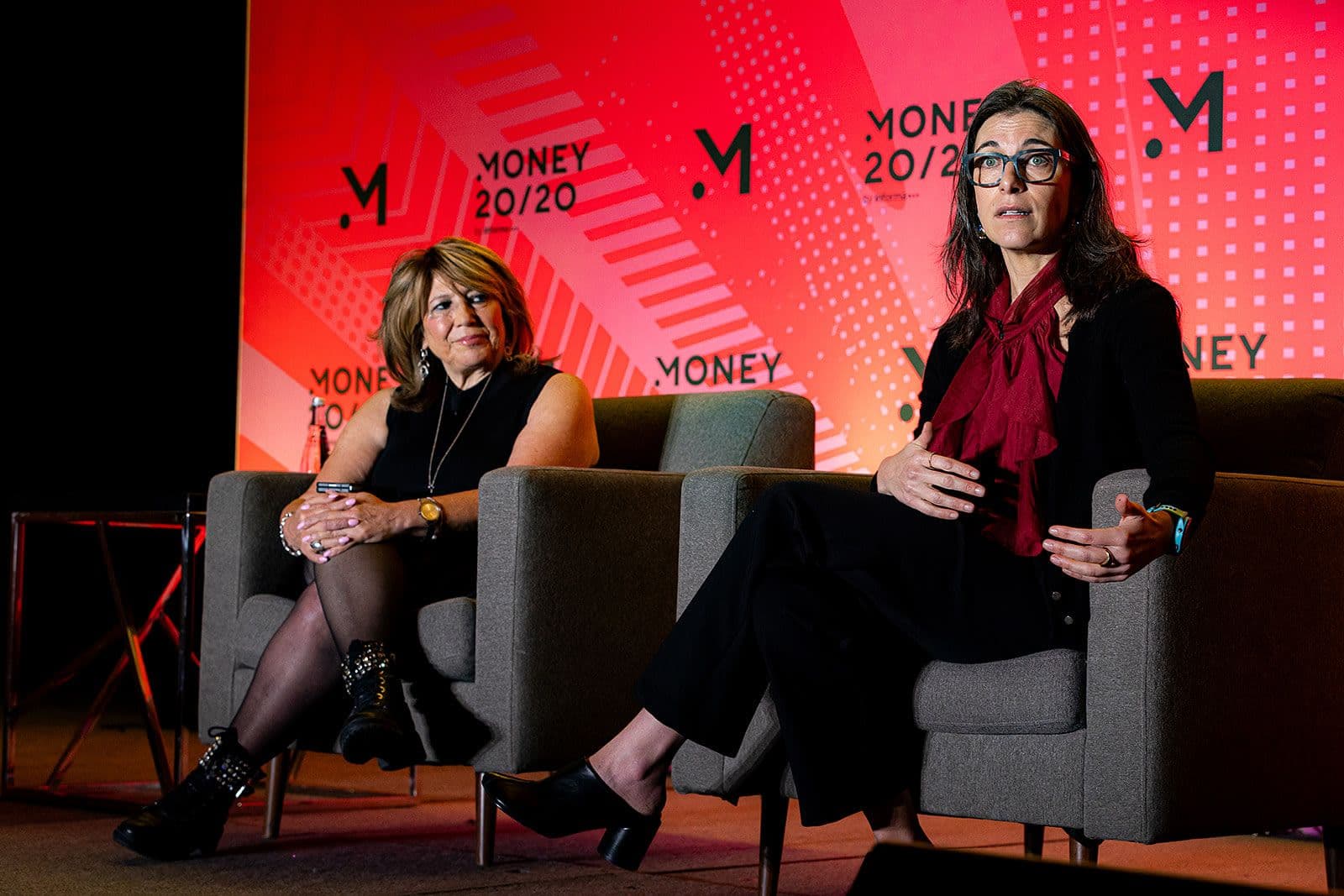 Two speakers in conversation on a Money20/20 USA 2025 stage