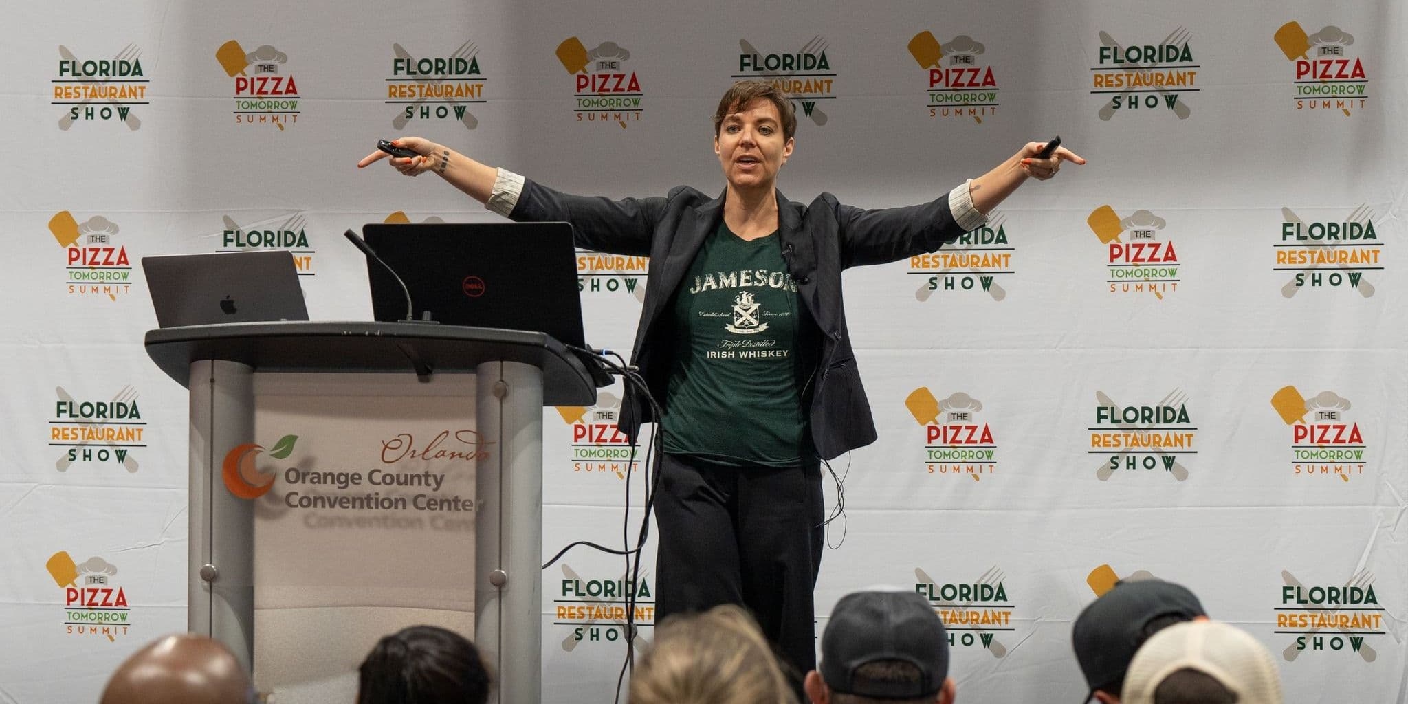 A speaker presents on the Florida Restaurant Show education stage at the Orange County Convention Center.
