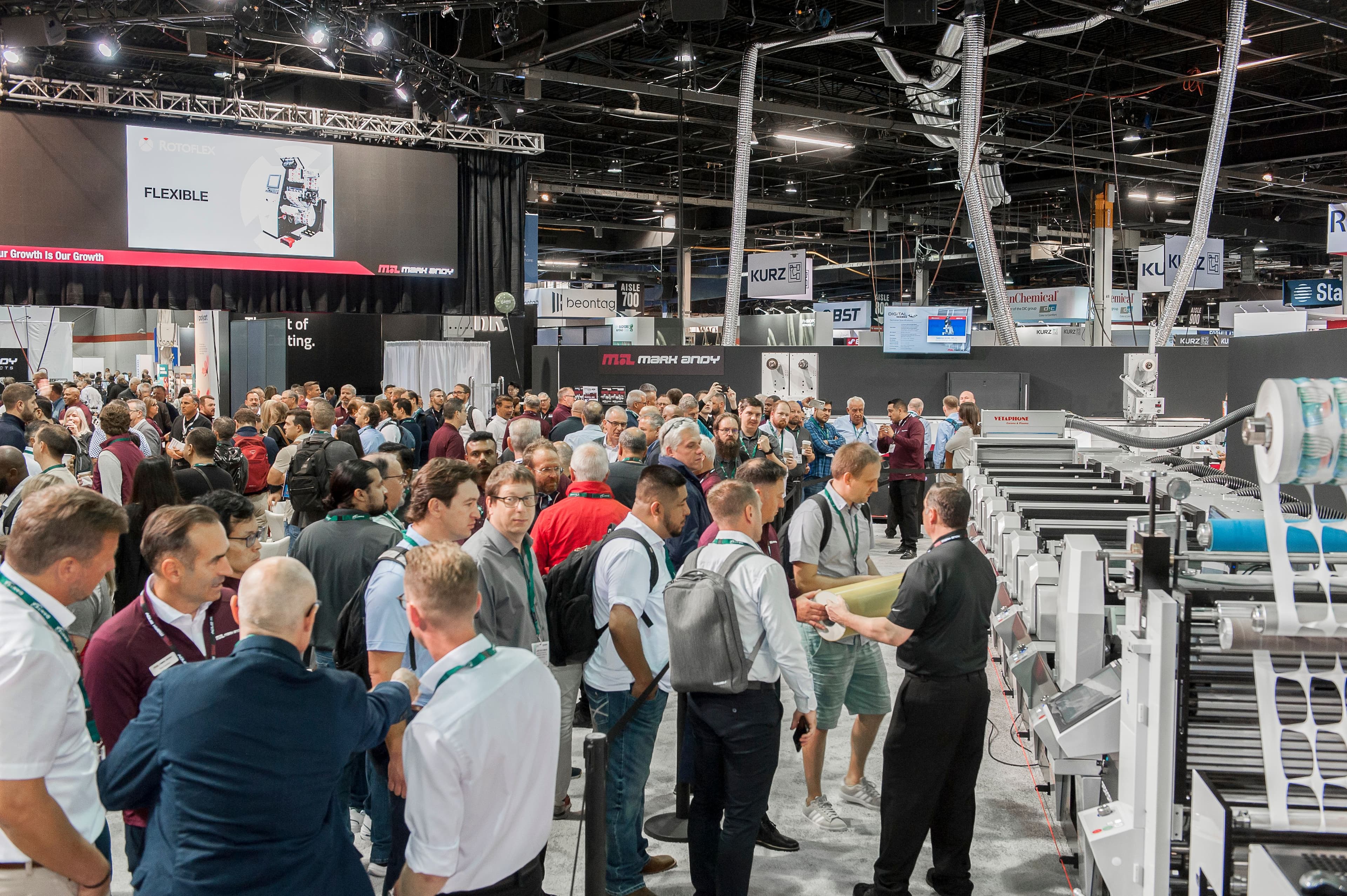 LOUPE Americas attendees walking the labels and package printing show floor
