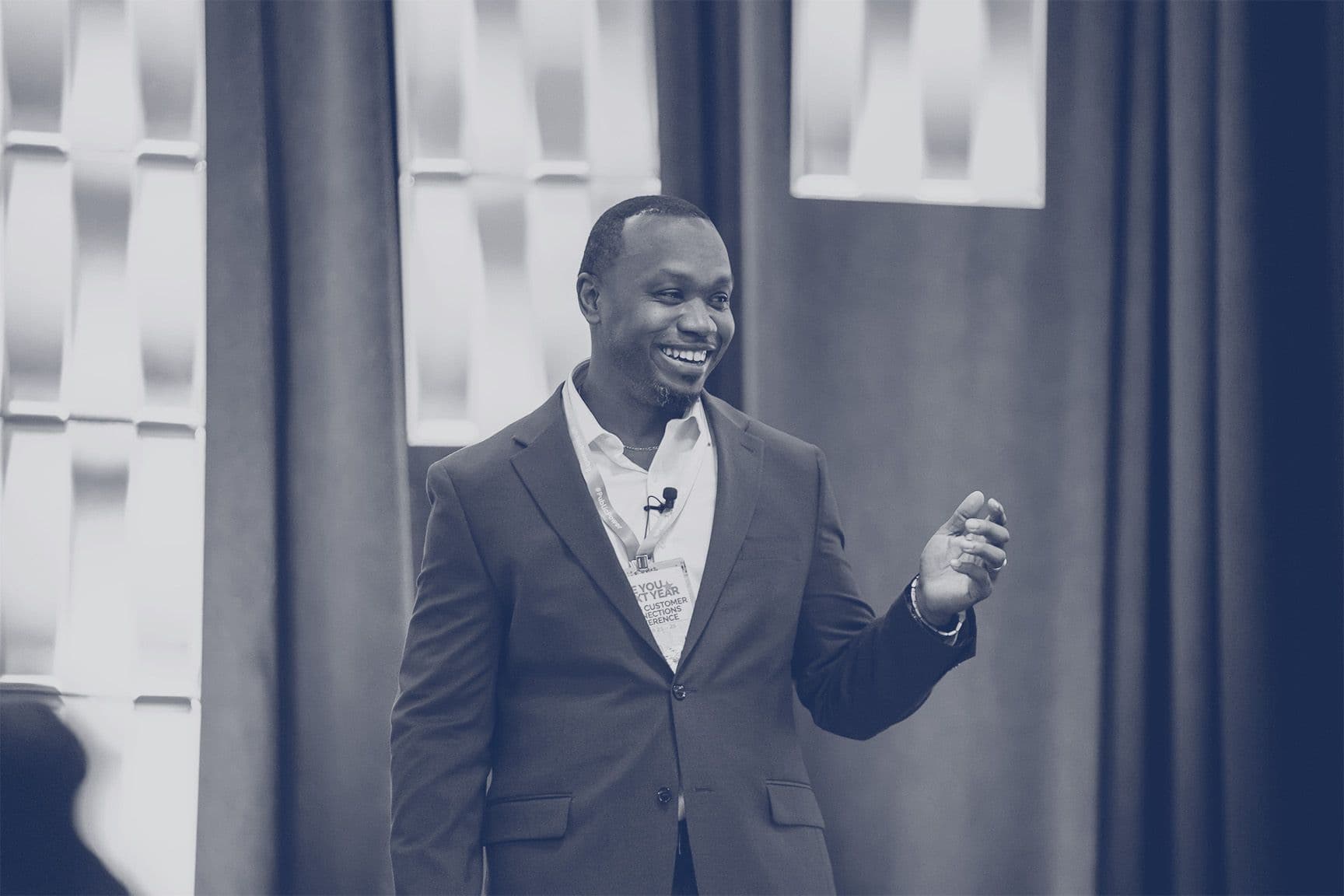 A presenter speaking during the 2025 Customer Connections Conference