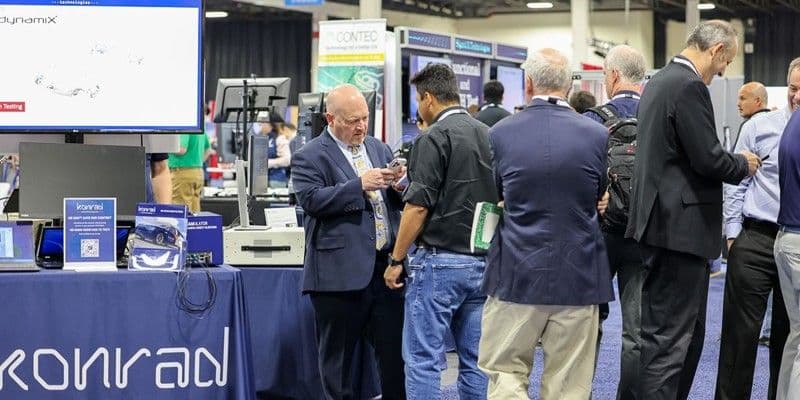 Visitors at an automotive testing stand