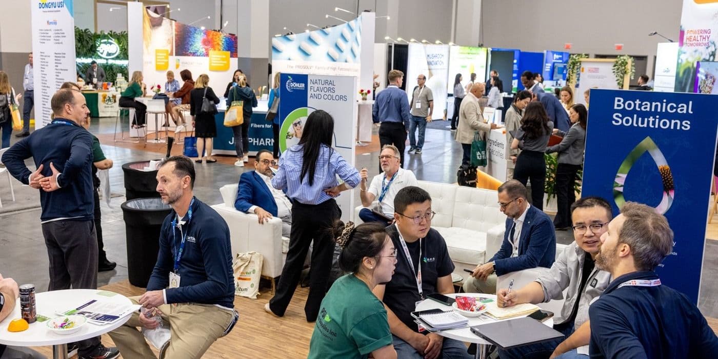 SupplySide Global attendees meeting in the Botanical Solutions networking area in 2025.