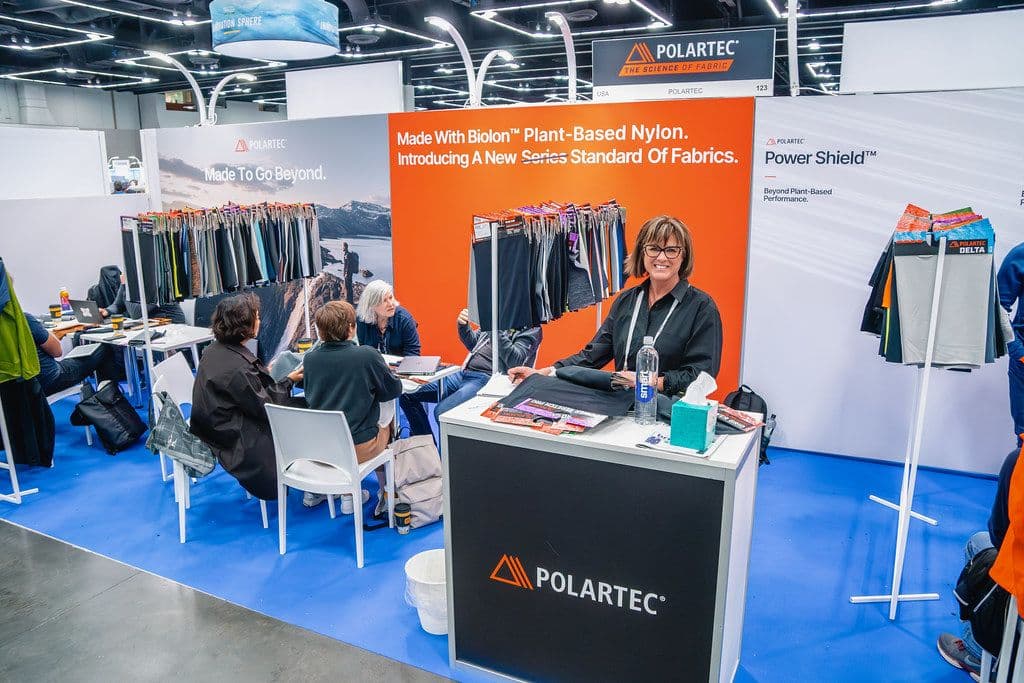 A staffed Polartec materials booth at Functional Fabric Fair Fall 2023.