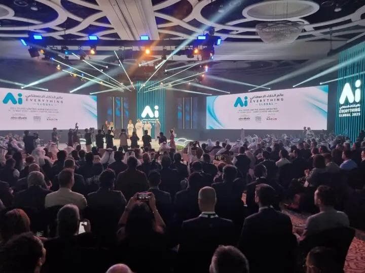 A full auditorium watching the opening ceremony on stage at Ai Everything Global in Abu Dhabi