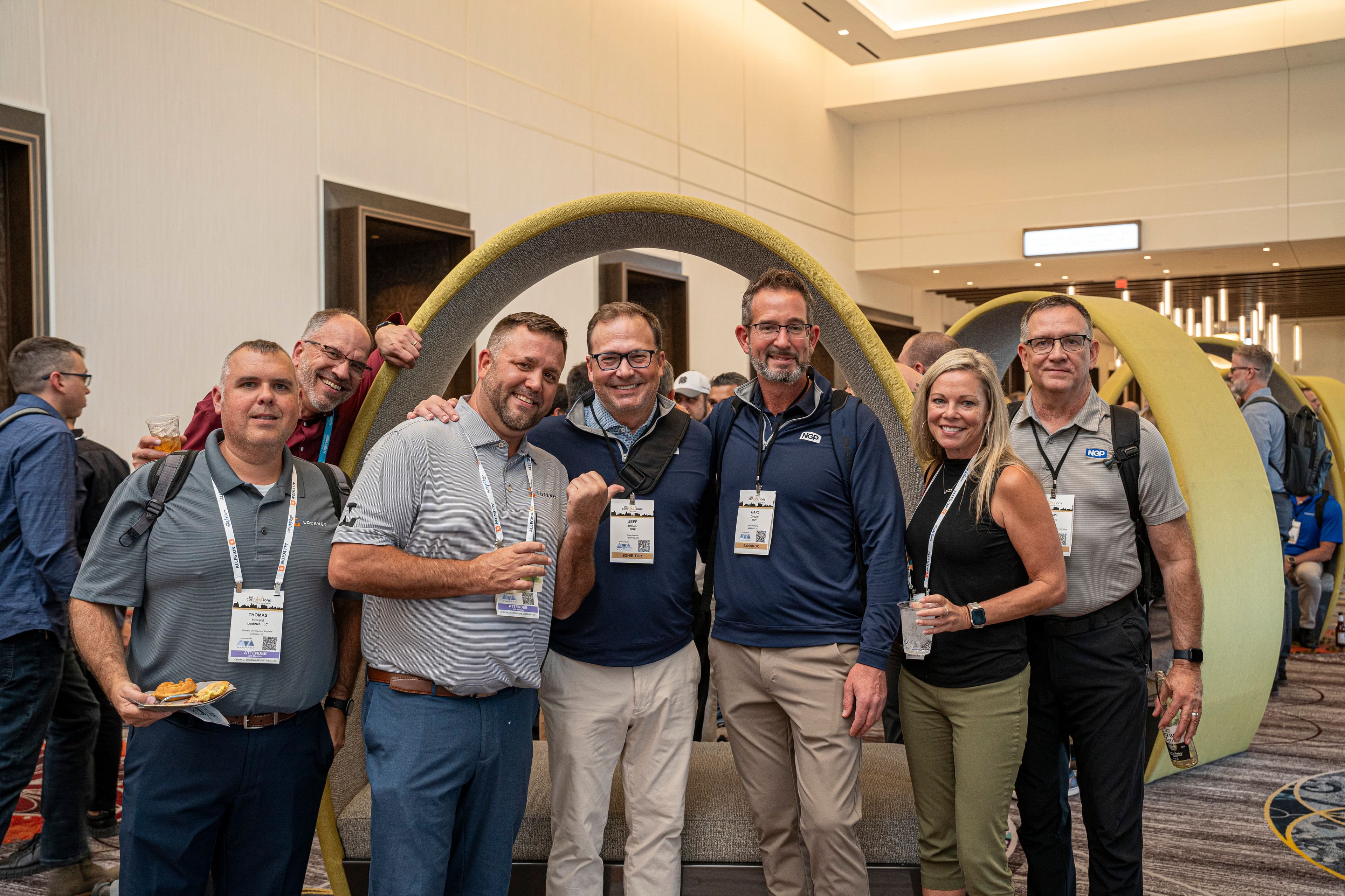 Seven DHI conNextions 2025 attendees gather during a networking break